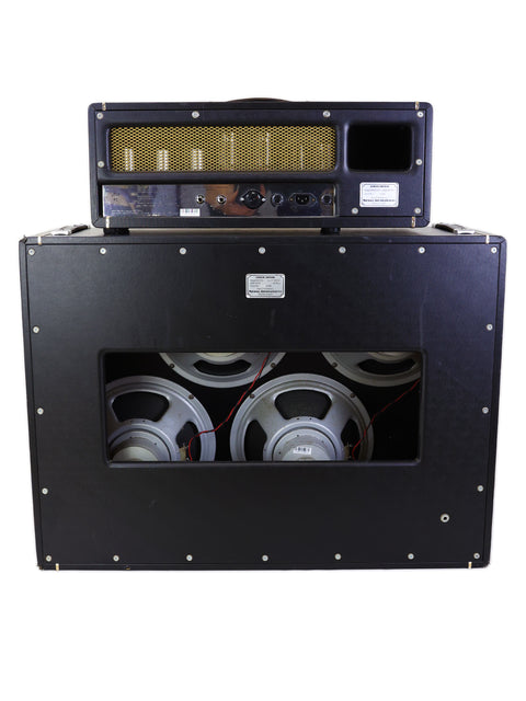 Black Marshall amplifier featuring two speakers and a microphone, representing the 2002 Limited Edition JTM45 Head and 412 Cabinet.