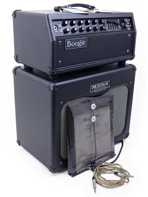 Black Mesa Boogie Mark V 35 amplifier with a guitar cable, paired with a 1 x 12" speaker cabinet, showcasing a classic setup.