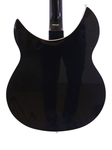 Black Rickenbacker 360 WB guitar from 1996, highlighted by a white pick guard, emphasizing its classic style.