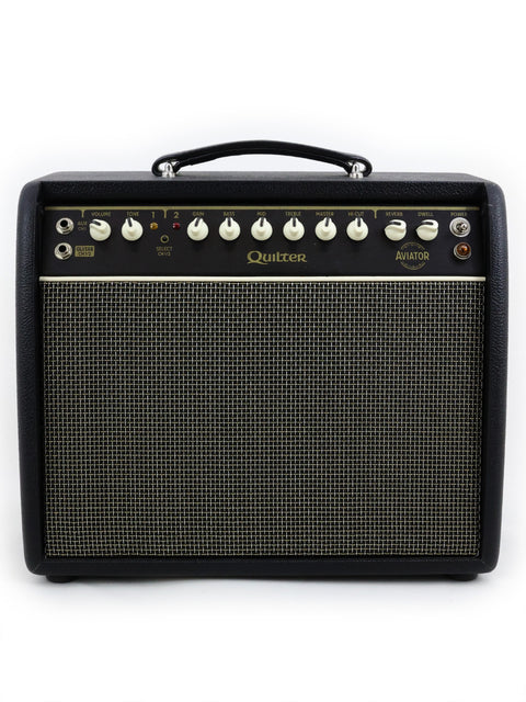 Black and gold Quilter Aviator Gold 8” Combo guitar amplifier on a white background, showcasing its sleek design.
