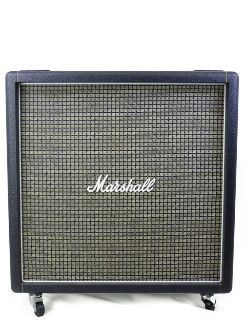 Black and white Marshall JTM45 amplifier showcasing its iconic design, perfect for rock music enthusiasts.
