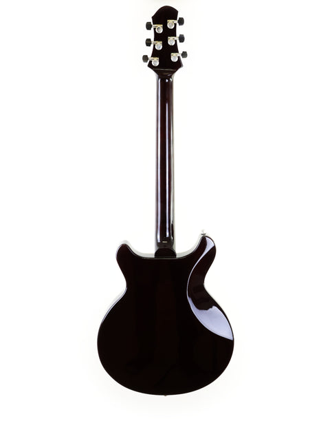 Black electric guitar vertically aligned against a white background.