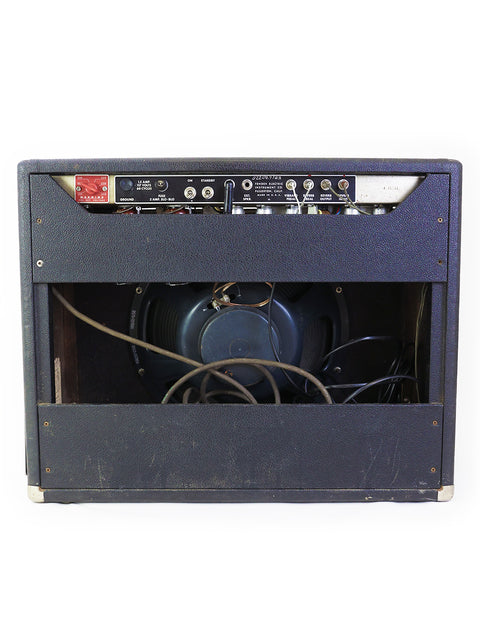 Blackface Vintage Fender Vibroverb 40W combo amplifier from 1964, complete with a speaker and wiring.