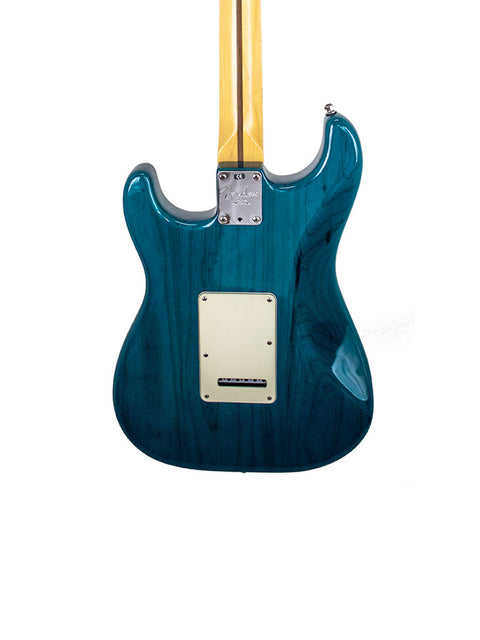 Blue electric guitar featuring a wooden body, representing the Fender American Deluxe Stratocaster, USA, 2004 model.
