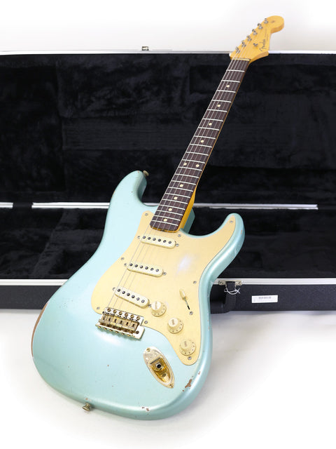Blue electric guitar in a protective case, highlighting the Fender Custom Shop Ltd Poblano Partscaster, USA, 2020 edition.