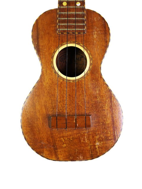 Classic 1924 Weissenborn Miami Style 3 Koa Ukulele, showcasing its charming wooden body and neck.