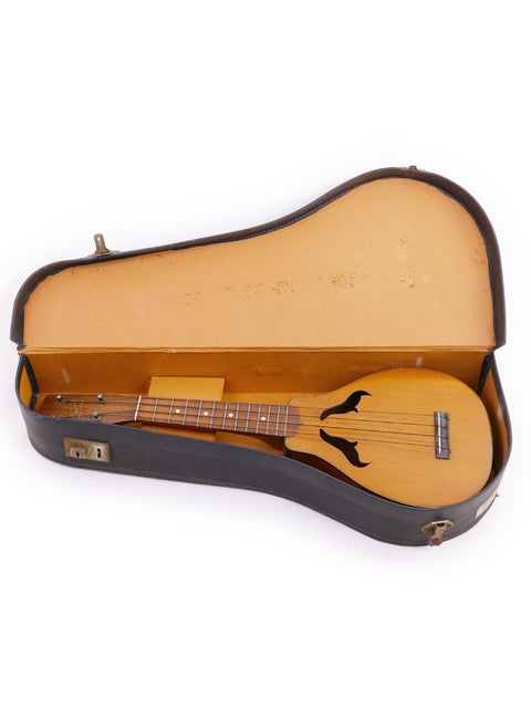 Classic 1927 Harmony Roy Smeck Vita-uke ukulele in a protective case, ideal for musicians and enthusiasts alike.