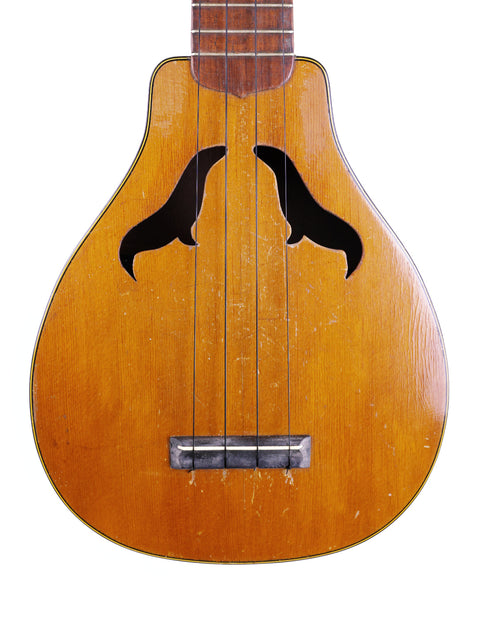 Classic 1927 Harmony Roy Smeck Vita-uke with a striking black and white pattern, ideal for music lovers and vintage enthusiasts.