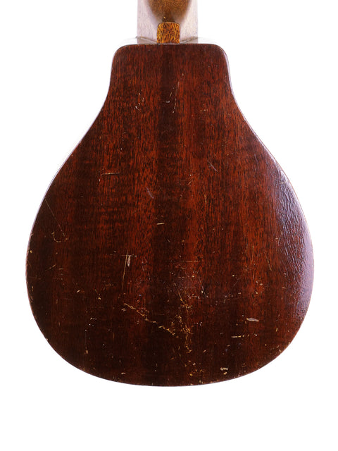 Classic 1927 Harmony Roy Smeck Vita-uke with a stunning wooden body and neck, ideal for aspiring musicians and collectors.
