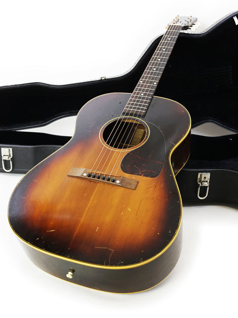 Classic 1940 Gibson J-45 acoustic guitar, known for its warm tone and vintage appeal, a must-have for any guitarist.