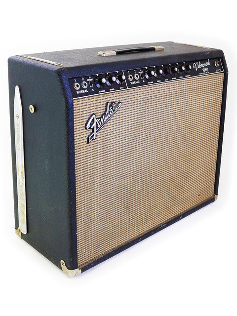 Classic 1964 Fender Vibroverb Export Model 40W combo amp in blackface, representing vintage American craftsmanship and sound.