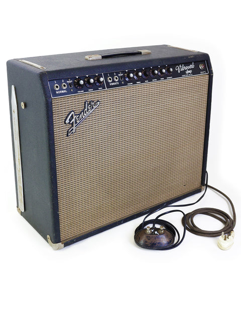 Classic 1964 Fender Vibroverb amplifier with a microphone and cable, featuring iconic blackface design for musicians.
