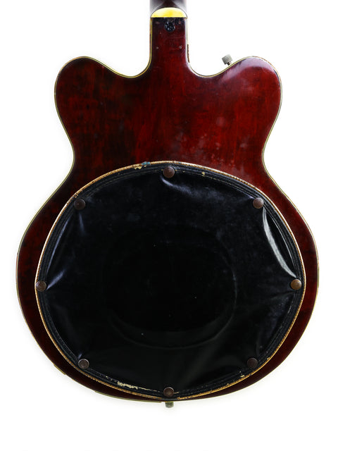 Classic 1964 Gretsch 6122 Country Gentleman guitar featuring a stylish black cover, ideal for musicians and collectors.