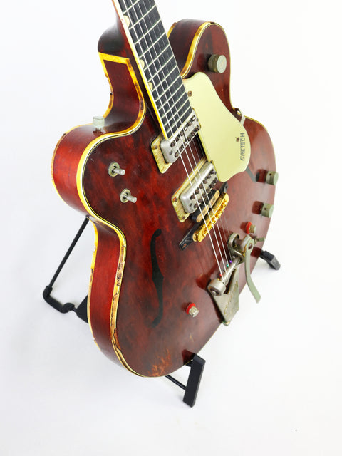Classic 1964 Gretsch 6122 Country Gentleman guitar featuring a wooden body and stylish black pick guard, ideal for any player.