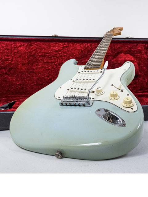 Classic 1972 Fender Stratocaster electric guitar, refinished, representing timeless style and quality. SOLD.