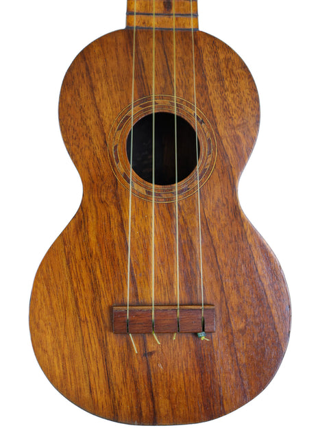  Classic Kaai Style 2 Koa Ukulele from Hawaii, c. 1918, with a wooden body and neck, representing timeless musical craftsmanship.