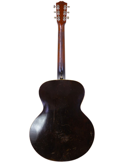 Classic black 1940s Gibson J-45 guitar, representing vintage style, with a 1938 Gibson ES-150 in the background.