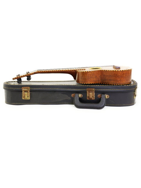 Classic guitar case with a wooden top and strap, perfect for the 1924 Weissenborn Miami Style 3 Koa Ukulele inside.