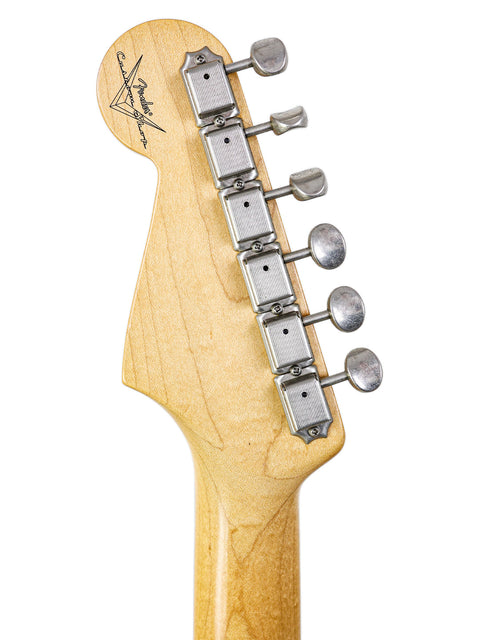 Close-up image of the headstock of a 2003 Fender Custom Shop 1960's Closet Classic Stratocaster, emphasizing its iconic shape.
