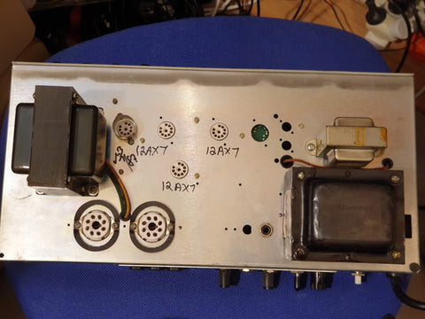 Close-up of a 1987 Mesa Boogie Mark III radio with a power supply, showcasing its vintage design and intricate details.