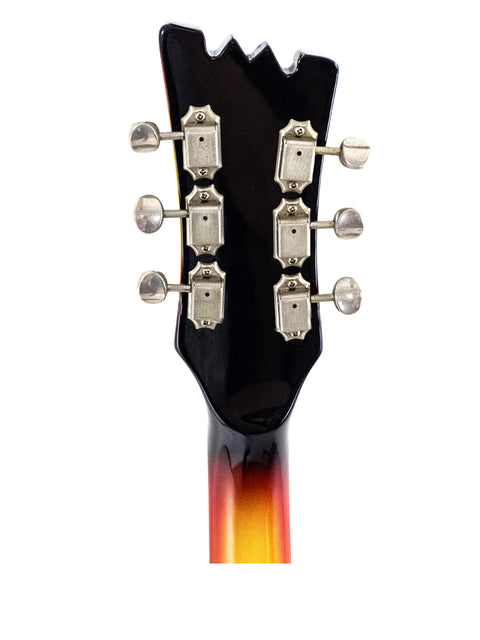 Close-up of a 1990s Mosrite guitar headstock, adorned with eye-catching yellow and black flame patterns, from The Ventures Model.