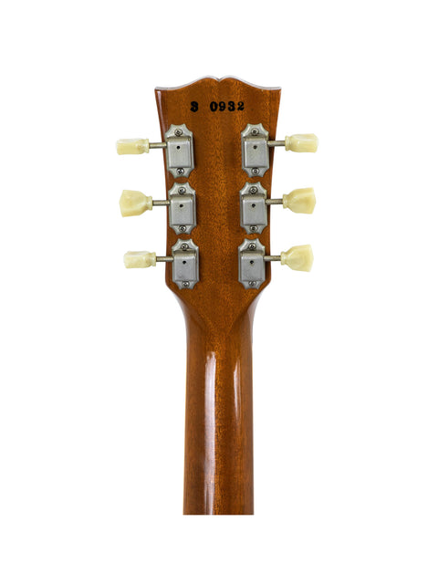 Close-up of a 1993 Gibson Les Paul headstock featuring four knobs, highlighting its vintage acoustic craftsmanship.