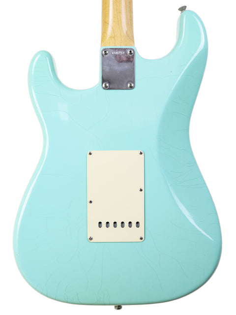 Close-up of a 2003 Fender Custom Shop 1960's Closet Classic Stratocaster, highlighting its classic features and finish.