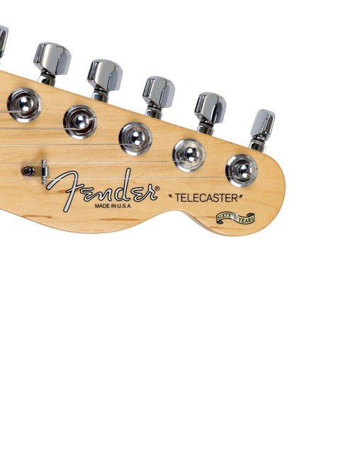 Close-up of a Fender Telecaster guitar headstock with tuning pegs.