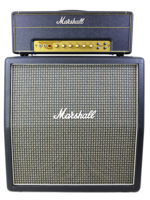 Close-up of a Marshall JTM45 amp, highlighting its vintage style and robust features, perfect for guitar enthusiasts.