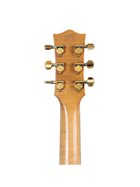 Close-up of a Maton Stage Deluxe Rock Maple acoustic guitar neck, showcasing its smooth wood grain and intricate fret details.