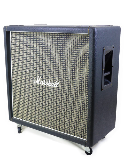Close-up of a black cabinet Marshall JTM45 amplifier, highlighting its classic look and craftsmanship from the UK, 2017.