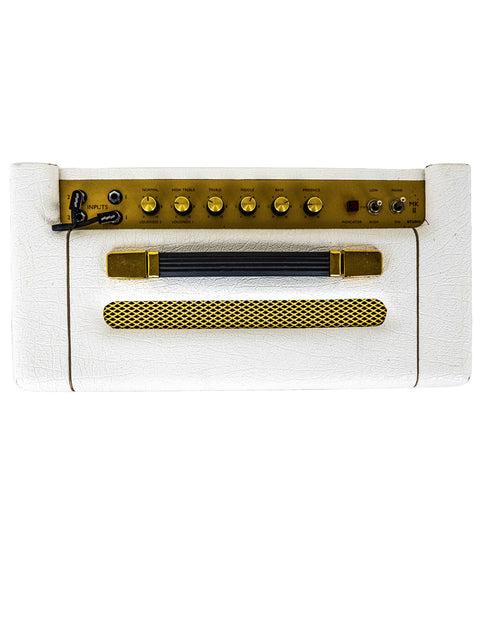 Close-up of a white and gold Marshall amplifier with a prominent gold tone knob, showcasing its sleek design and craftsmanship.
