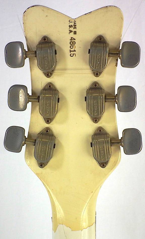 Close-up of the headstock from a 1968 Gretsch 6136 White Falcon, highlighting its unique features and vintage appeal for buyers.
