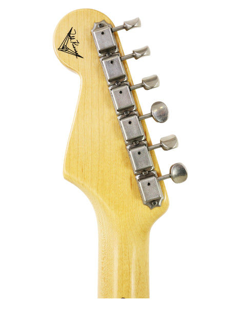 Close-up of the neck of a Fender Custom Shop 50th Anniversary ‘54 Stratocaster, showcasing its craftsmanship and details.
