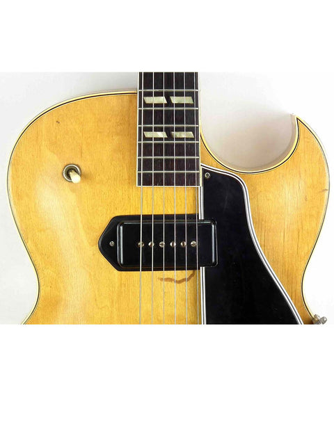 Close-up shot of a 1953 Gibson ES 175 DN guitar, highlighting the elegant black pick guard.