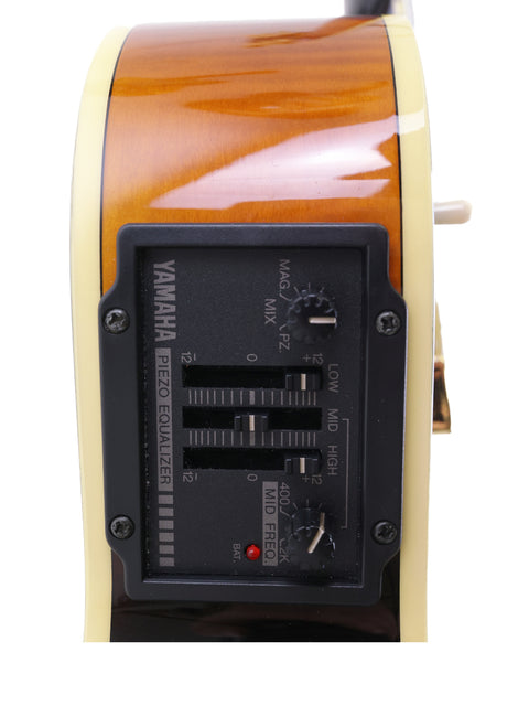 Close-up shot of a Yamaha AEX1500 guitar, highlighting its digital display and craftsmanship from Japan, 2004.