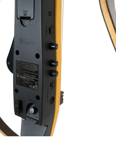 Close-up shot of a camera adorned with a yellow and black strap, emphasizing its modern look and vibrant color scheme.
