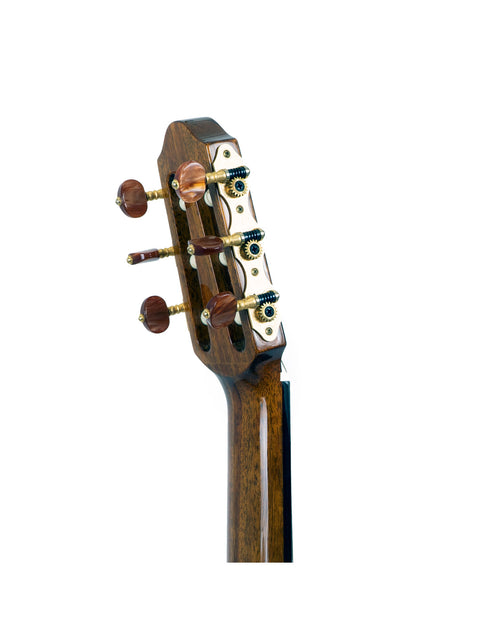 Close-up shot of the neck on a Yamaha SLG 120NW Silent Guitar, featuring beautiful wood grain and sleek lines.