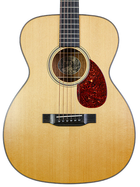 Collings Julian Lage Signature OM1 acoustic guitar, model Martin Martin Jr., showcasing its elegant design and craftsmanship.
