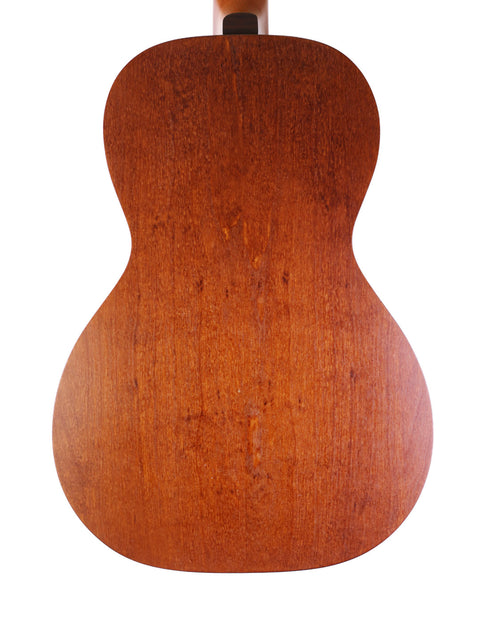 Detailed close-up of the back of Art & Lutherie AMI Cedar guitar, emphasizing the wood's natural texture.