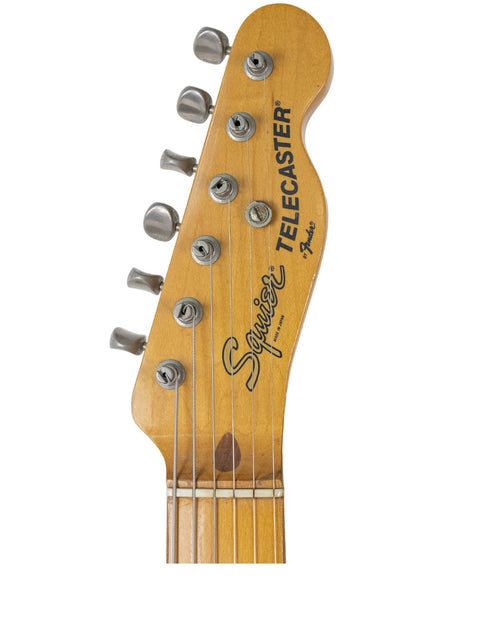 Detailed view of a 1984 Fender Squier JV Telecaster headstock, highlighting its classic features and Japanese craftsmanship.
