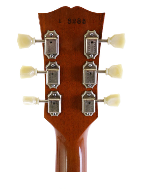 Detailed view of a 1991 Gibson Les Paul Classic 1960 Reissue headstock, highlighting its iconic shape and hardware.