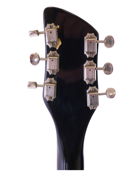 Detailed view of a 1996 Rickenbacker 360 WB headstock, showcasing four tuning knobs.