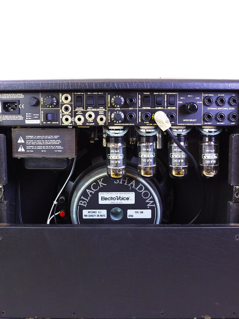 Detailed view of a 2003 Mesa Boogie Mark IV Combo Amplifier, highlighting the speaker and control panel features.