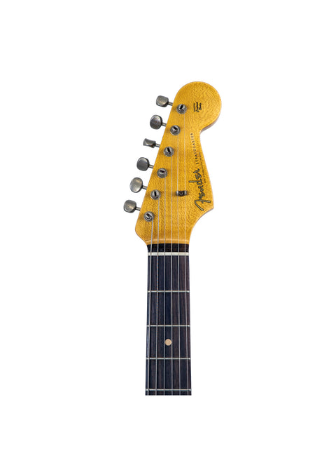 Detailed view of a Fender '60s Strat Partscaster with a striking yellow neck, set against an Olympic White finish.
