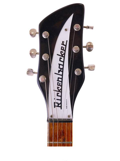 Detailed view of a Fender guitar headstock, showcasing the logo, from a 1996 USA Rickenbacker 360 WB model.