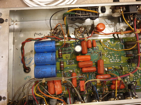 Detailed view of a circuit board from a 1987 Mesa Boogie Mark III, featuring wires and various electronic elements.