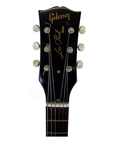  Detailed view of a guitar headstock with "Gibson" branding, showcasing the 2007 Custom Shop '57 Les Paul Junior Reissue VOS.