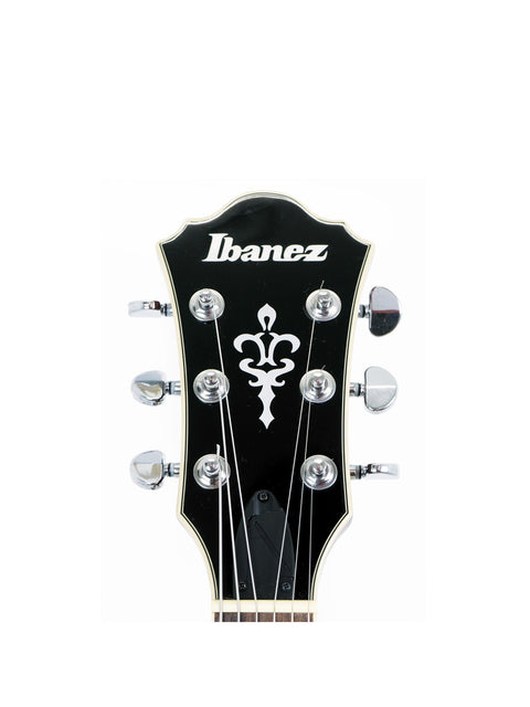 Detailed view of an Ibanez Artcore AS73 FM headstock showcasing the name "danez."
