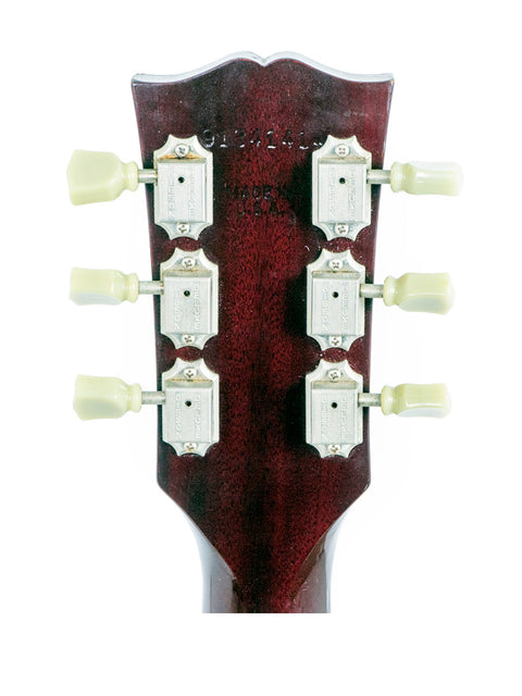 Detailed view of the headstock from a 1991 Gibson Les Paul Standard electric guitar, highlighting its classic features.
